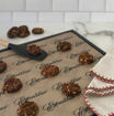 Cookies placed on an Excalibur ParaFlexx Premium non-stick sheet, showing smooth release for baking and dehydrating.